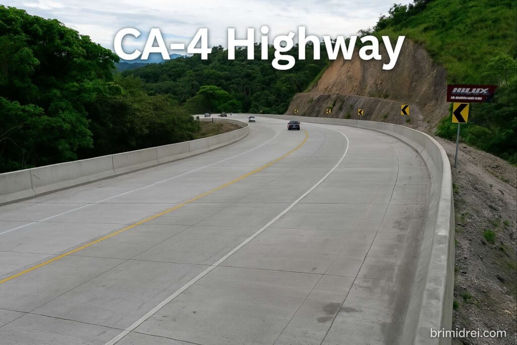 Modern section of the CA-4 Highway curving through a mountainous area with light traffic and lush greenery in western Honduras.
