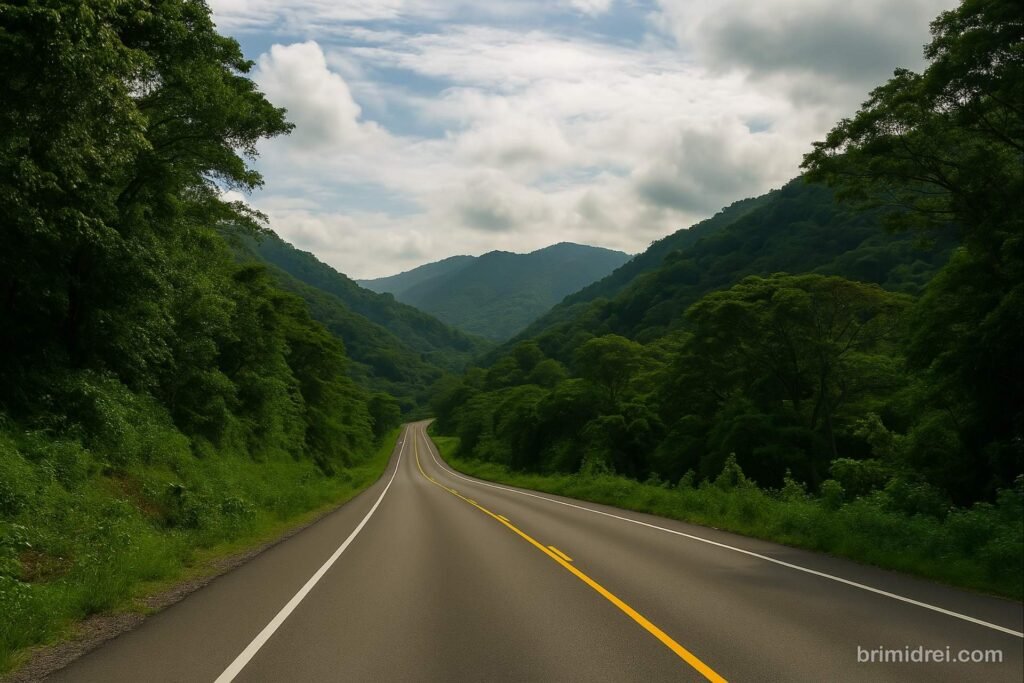 Paved highway winding through green mountains on the way to Santa Rosa de Copán